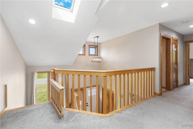 4925 Bentbrook Dr, Manlius, NY 13104 - stairway featuring carpet flooring, plenty of natural light, a skylight, recessed lighting, and lofted ceiling