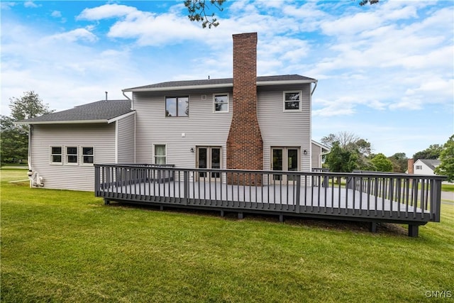 4925 Bentbrook Dr, Manlius, NY 13104 - rear view of house featuring a wooden deck, a chimney, a yard, and french doors