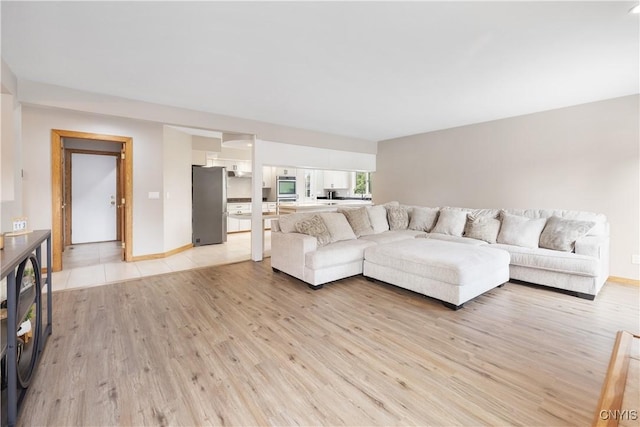4925 Bentbrook Dr, Manlius, NY 13104 - living area with light wood-style floors and baseboards