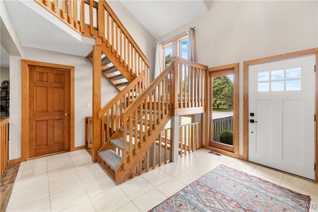 4925 Bentbrook Dr, Manlius, NY 13104 - tiled foyer entrance with a towering ceiling and stairway