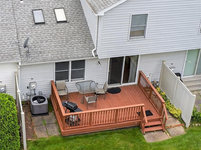54 Flower Dale Cir, Greece, NY 14626 - back of house featuring a shingled roof and a wooden deck