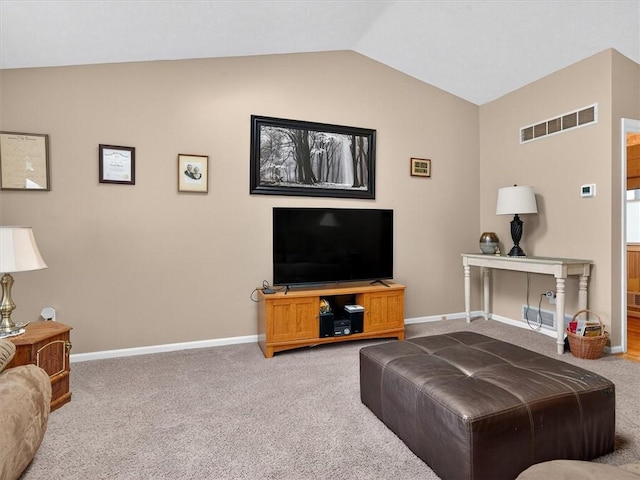 54 Flower Dale Cir, Greece, NY 14626 - carpeted living area featuring lofted ceiling and baseboards