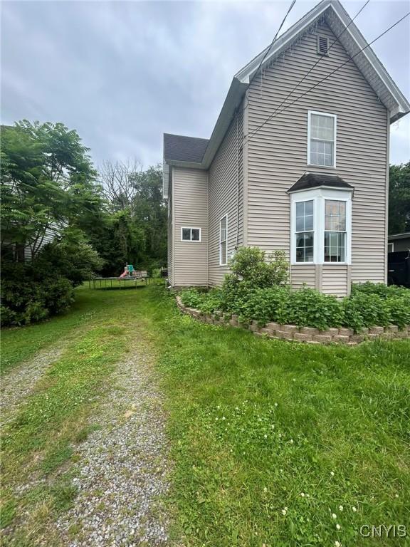 24 Elm St, Whitestown, NY 13492 - view of property exterior featuring a yard