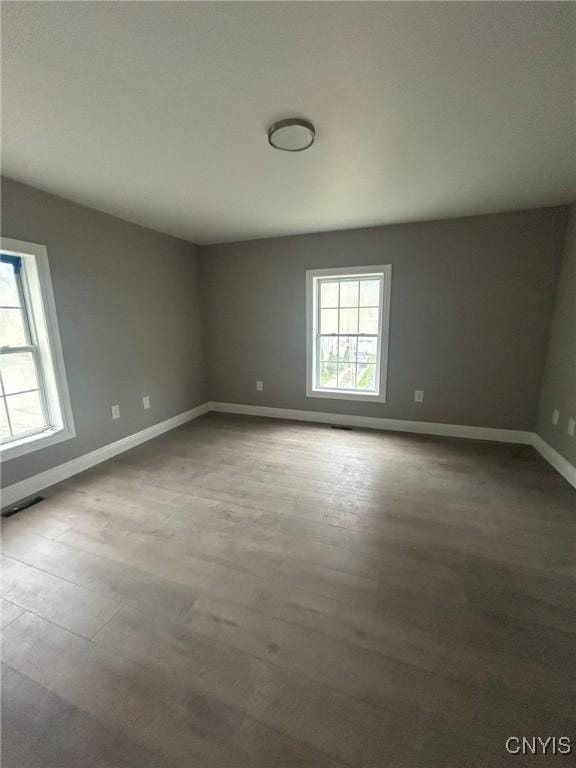 24 Elm St, Whitestown, NY 13492 - unfurnished room featuring wood finished floors and baseboards