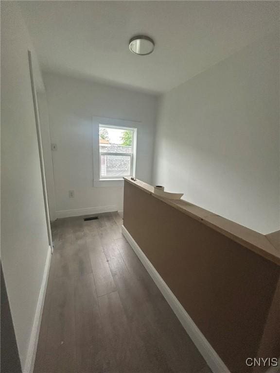 24 Elm St, Whitestown, NY 13492 - corridor featuring an upstairs landing and wood finished floors