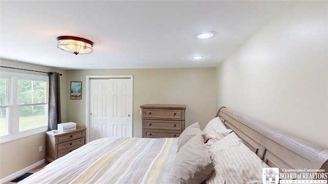 12483 Sawmill Run Rd, South Valley, NY 14738 - bedroom featuring a closet and recessed lighting