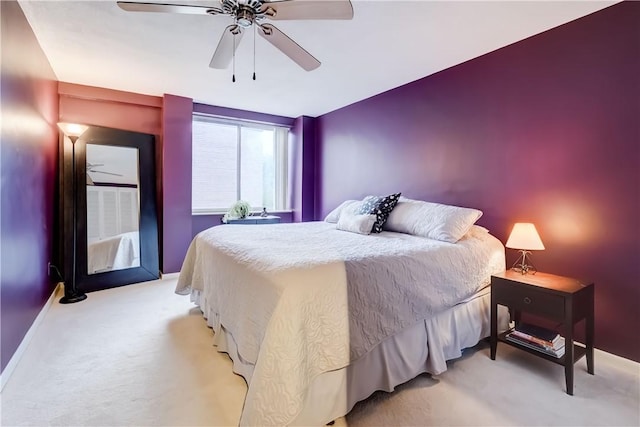 1400 E Ave Unit Un609, Rochester, NY 14610 - bedroom featuring light carpet and ceiling fan