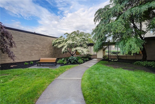 1400 E Ave Unit Un609, Rochester, NY 14610 - view of community featuring a lawn