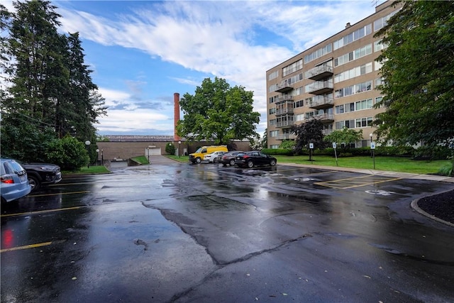 1400 E Ave Unit Un609, Rochester, NY 14610 - view of asphalt road featuring traffic signs