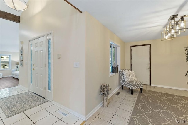 4302 Cinnamon Path, Clay, NY 13090 - foyer featuring light tile patterned floors and baseboards