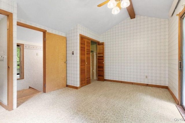 2361 E Hill Rd, Preble, NY 13077 - unfurnished bedroom featuring wallpapered walls, a closet, carpet, and a ceiling fan