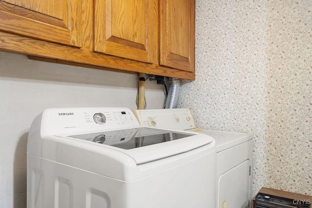2361 E Hill Rd, Preble, NY 13077 - laundry room with cabinet space, wallpapered walls, and independent washer and dryer
