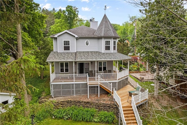 5107 County Road 36, Richmond, NY 14471 - back of house with roof with shingles, a porch, a chimney, and stairs