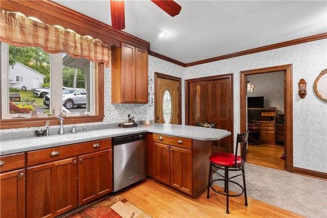 5107 County Road 36, Richmond, NY 14471 - kitchen with dishwasher, crown molding, a peninsula, wallpapered walls, and light wood finished floors