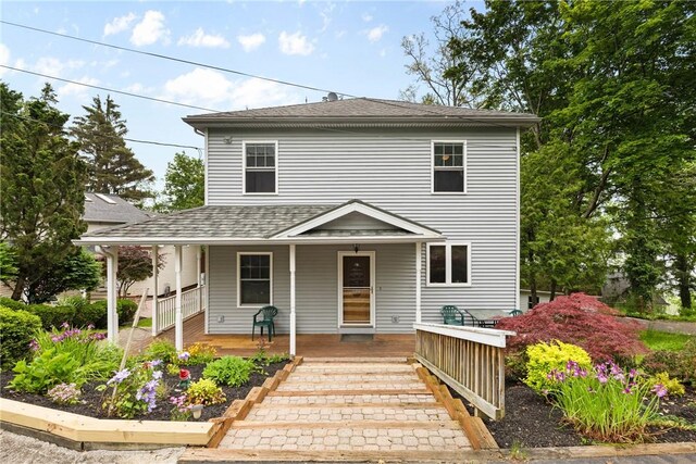 5107 County Road 36, Richmond, NY 14471 - view of front of home featuring roof with shingles and a porch