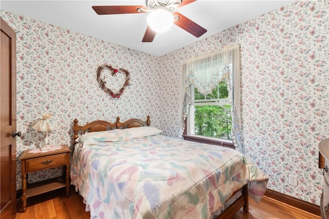 5107 County Road 36, Richmond, NY 14471 - bedroom featuring light wood-style flooring, wallpapered walls, and a ceiling fan