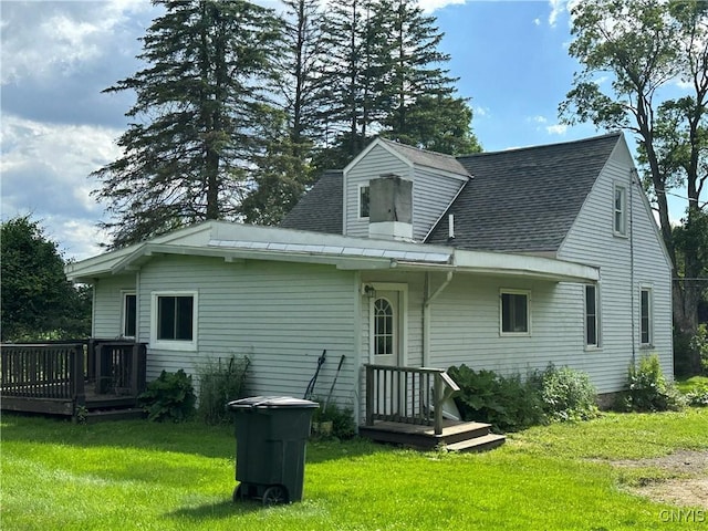8362 Price Rd, Floyd, NY 13354 - back of property with a yard, roof with shingles, and a deck