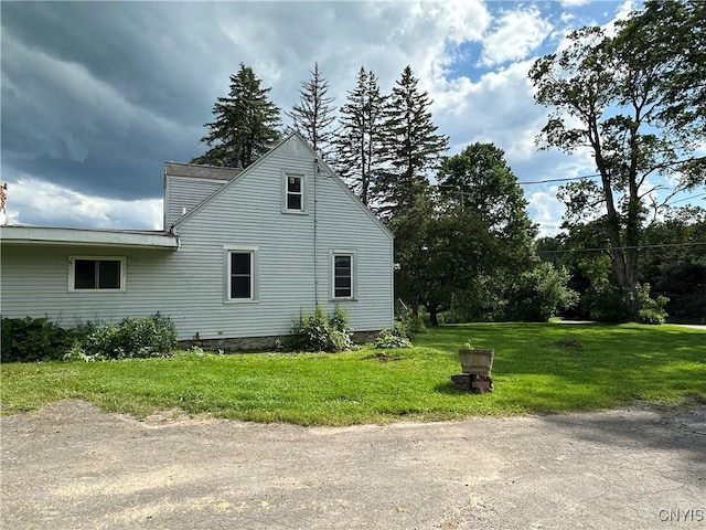 8362 Price Rd, Floyd, NY 13354 - view of side of home with a yard