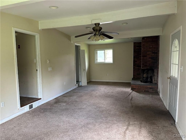 8362 Price Rd, Floyd, NY 13354 - unfurnished living room with carpet floors, ceiling fan, beamed ceiling, a brick fireplace, and recessed lighting