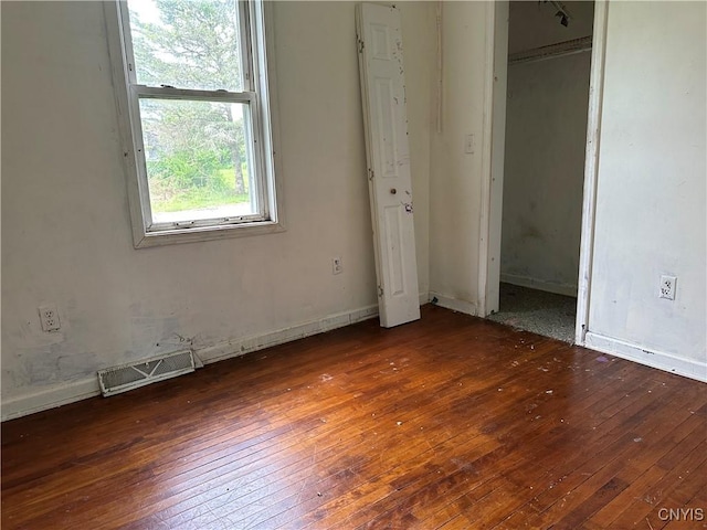 8362 Price Rd, Floyd, NY 13354 - unfurnished bedroom featuring hardwood / wood-style flooring and baseboards