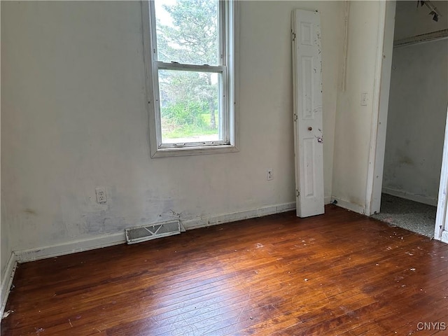 8362 Price Rd, Floyd, NY 13354 - unfurnished bedroom featuring hardwood / wood-style floors and baseboards