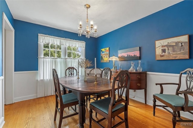 312 S Orchard Rd, Geddes, NY 13219 - dining area featuring a chandelier and wood finished floors