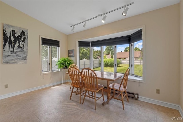 312 S Orchard Rd, Geddes, NY 13219 - dining room with plenty of natural light, track lighting, and lofted ceiling