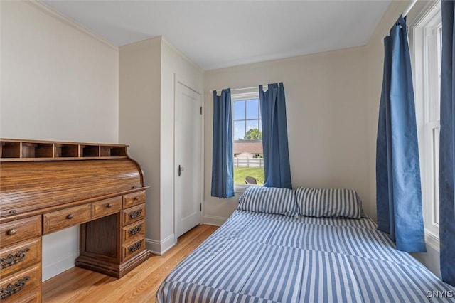 312 S Orchard Rd, Geddes, NY 13219 - bedroom with light wood-style flooring and baseboards