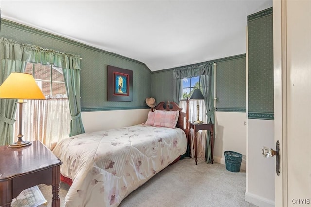 312 S Orchard Rd, Geddes, NY 13219 - bedroom featuring wallpapered walls, carpet flooring, and vaulted ceiling