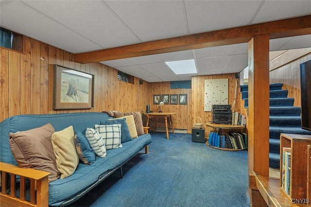 312 S Orchard Rd, Geddes, NY 13219 - living area featuring wooden walls, a baseboard radiator, carpet, and stairway