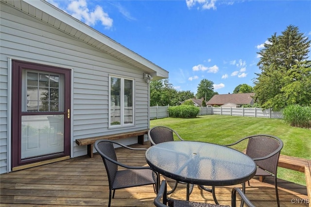 312 S Orchard Rd, Geddes, NY 13219 - deck with outdoor dining area and a fenced backyard