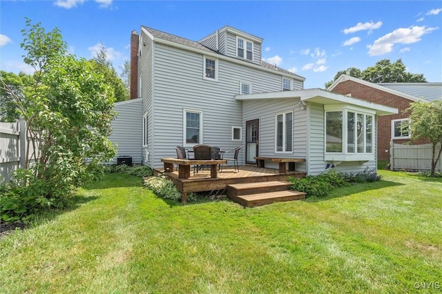 312 S Orchard Rd, Geddes, NY 13219 - rear view of house featuring a deck and a chimney