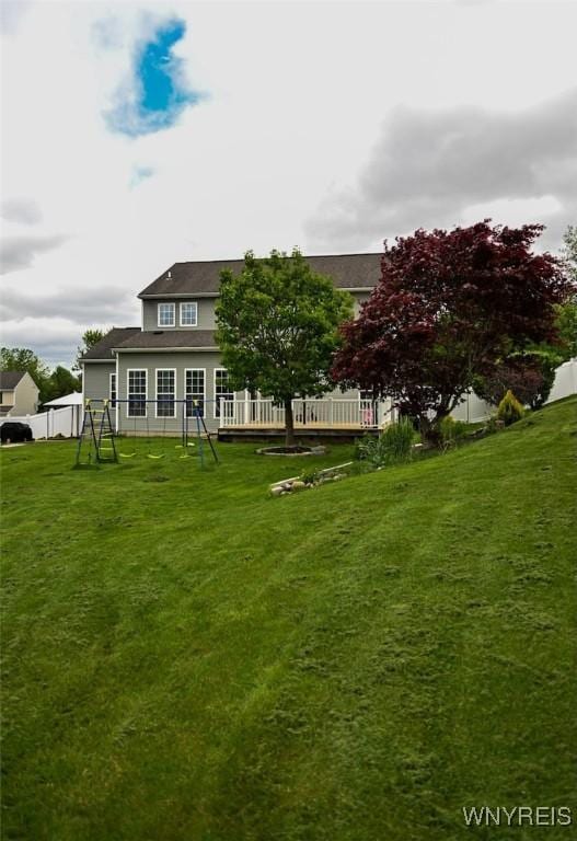 107 Naymik Dr, Sullivan, NY 13037 - rear view of house featuring a playground