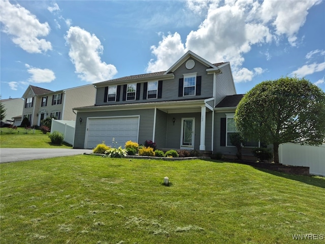 107 Naymik Dr, Sullivan, NY 13037 - traditional-style house with driveway and a garage