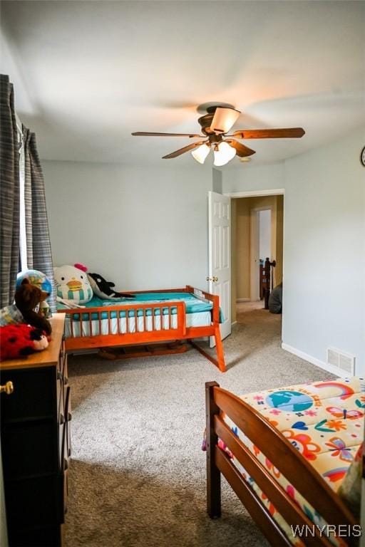 107 Naymik Dr, Sullivan, NY 13037 - carpeted bedroom with baseboards and a ceiling fan