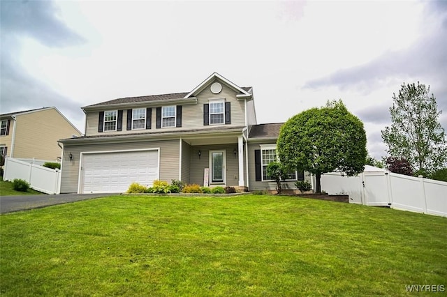 107 Naymik Dr, Sullivan, NY 13037 - traditional-style house with an attached garage and asphalt driveway