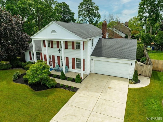 87 Old Spring Ln, Amherst, NY 14221 - neoclassical / greek revival house featuring a porch, a garage, a shingled roof, and concrete driveway