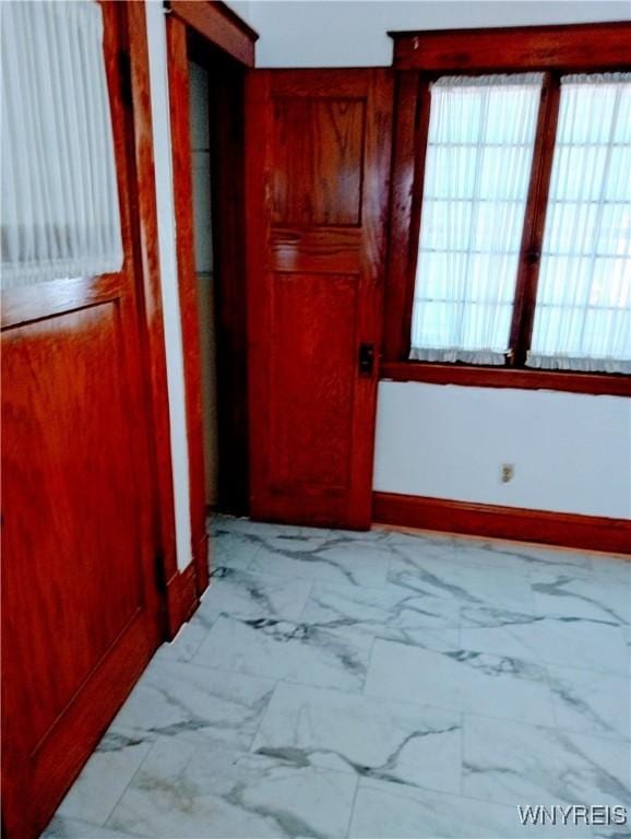 2436 Cleveland Ave, Niagara Falls, NY 14305 - entryway with baseboards and light marble finish flooring