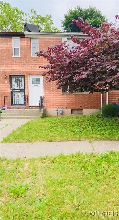 23 Bennett Village Ter, Buffalo, NY 14214 - view of front of house featuring brick siding