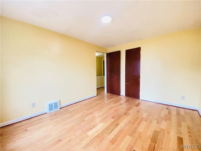 23 Bennett Village Ter, Buffalo, NY 14214 - spare room featuring wood finished floors and baseboards