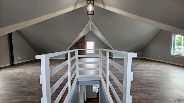 726 S Main St, Shelby, NY 14103 - stairs with wood finished floors, vaulted ceiling, and ceiling fan
