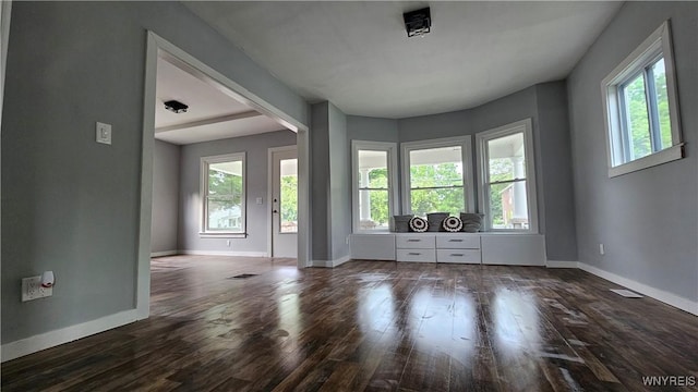 726 S Main St, Shelby, NY 14103 - unfurnished room with healthy amount of natural light and dark wood-style floors