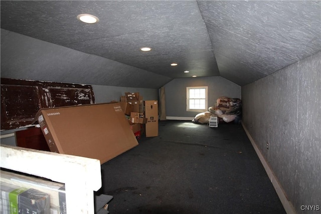 218 S Terry Rd, Geddes, NY 13219 - additional living space with vaulted ceiling, recessed lighting, and carpet floors