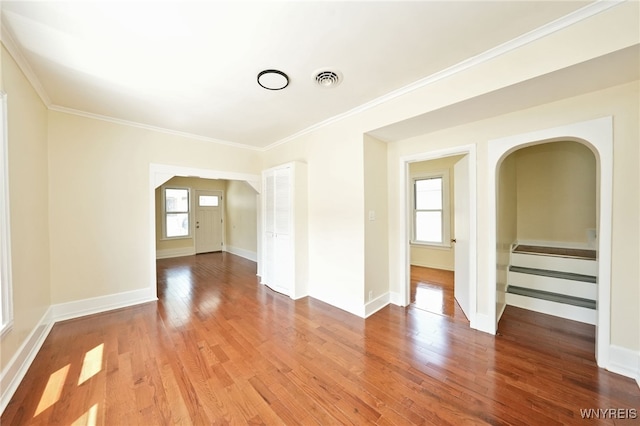 50 Avery Pl, Cheektowaga, NY 14225 - spare room featuring arched walkways, wood finished floors, stairs, and ornamental molding
