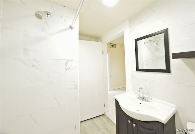 50 Avery Pl, Cheektowaga, NY 14225 - full bath with vanity, tile walls, and a shower