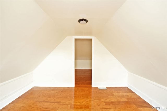 50 Avery Pl, Cheektowaga, NY 14225 - additional living space featuring vaulted ceiling and wood finished floors