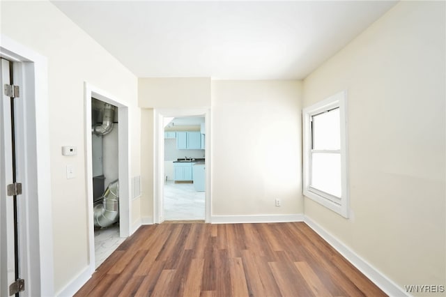 50 Avery Pl, Cheektowaga, NY 14225 - unfurnished room with wood finished floors and baseboards