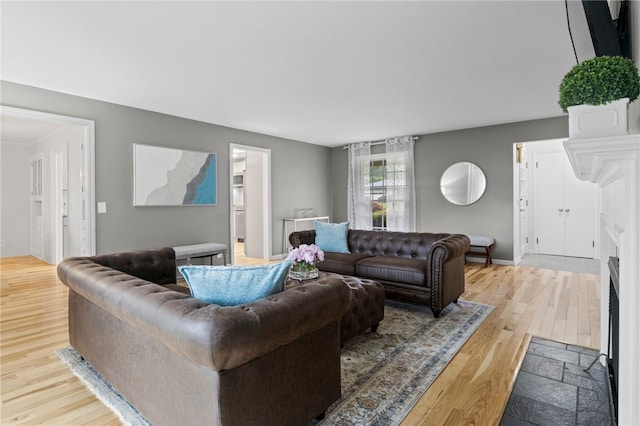 100 Carverdale Dr, Brighton, NY 14618 - living area featuring wood finished floors and baseboards