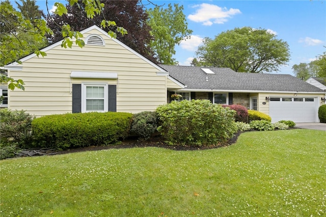 100 Carverdale Dr, Brighton, NY 14618 - view of front of house with an attached garage, a front lawn, asphalt driveway, and roof with shingles