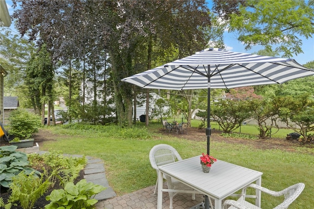 100 Carverdale Dr, Brighton, NY 14618 - view of grassy yard featuring a patio and outdoor dining space